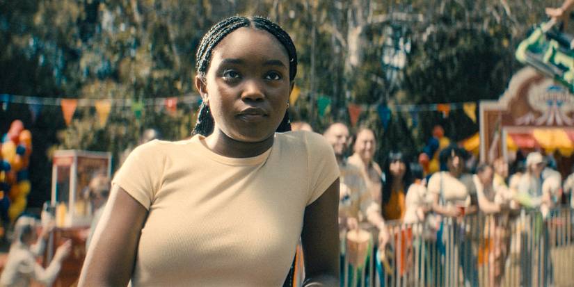 Presley Collins (Aliyah Mastin) looking ahead at the carnival in Paradise episode 4