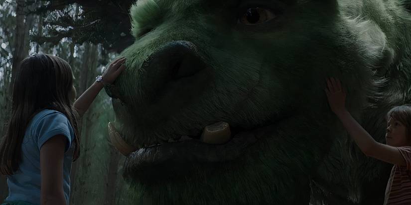 Oona Laurence as Natalie and Oakes Fegley as Pete with Eliot in Pete's Dragon 2016