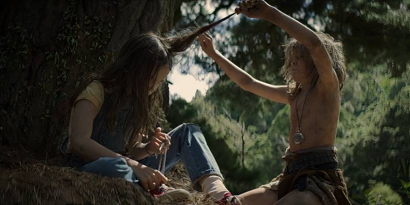 Oona Laurence as Natalie and Oakes Fegley as Pete in the Pete's Dragon 2016 remake