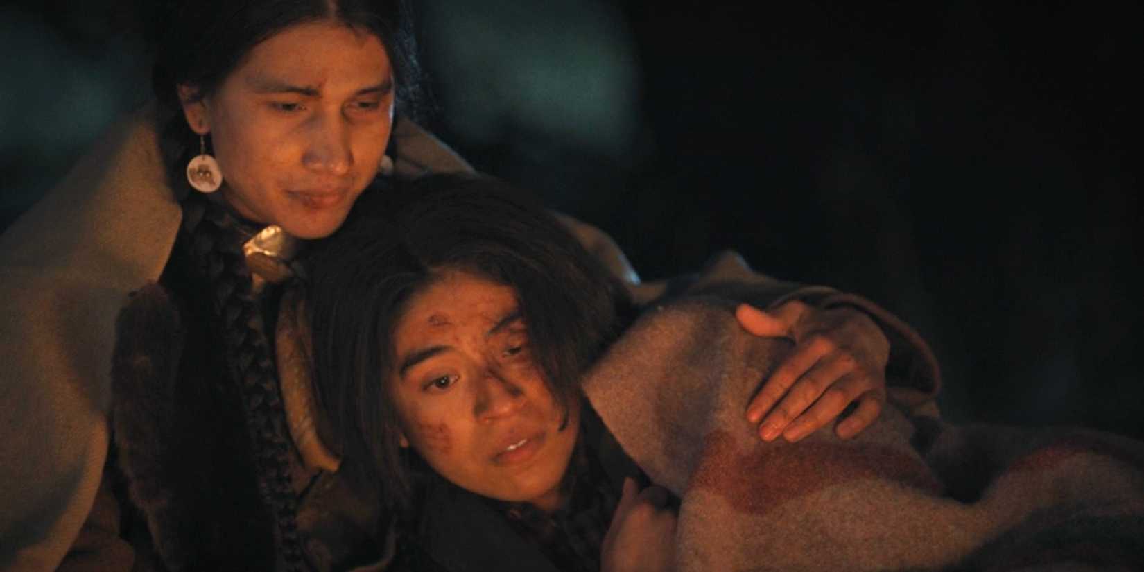 Pete Plenty Clouds (Cole Brings Plenty) and Teonna Rainwater (Aminah Nieves) snuggling in 1923 season 1, episode 8