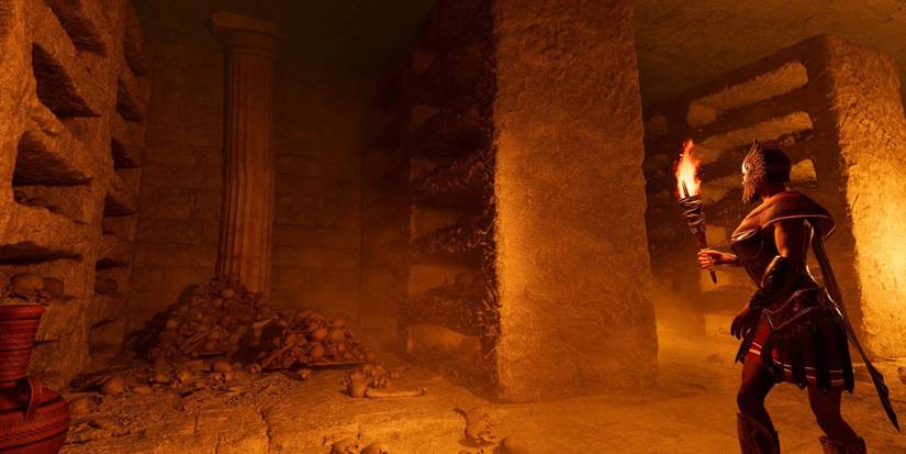 A Greek warrior exploring an ancient tomb littered with bones