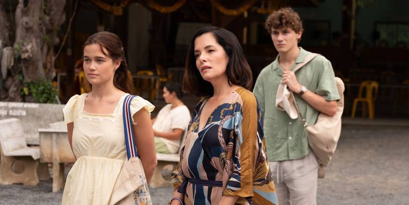 Piper (Sarah Catherine Hook), Victoria (Parker Posey), and Lochlan (Sam Nivola) standing together in The White Lotus season 3.
