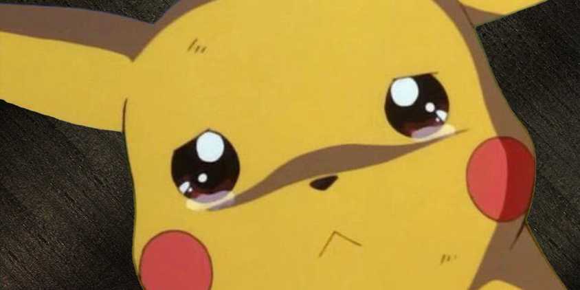 Pikachu looking sad on a dark background.