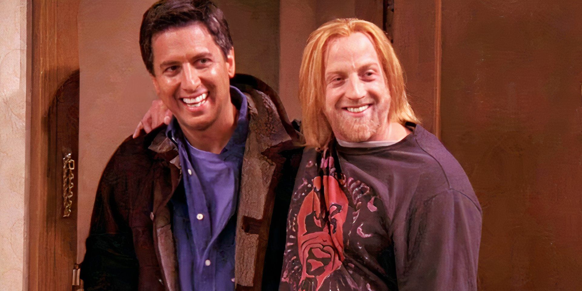Raymond smiling while standing next to someone in Everybody Hates Raymond