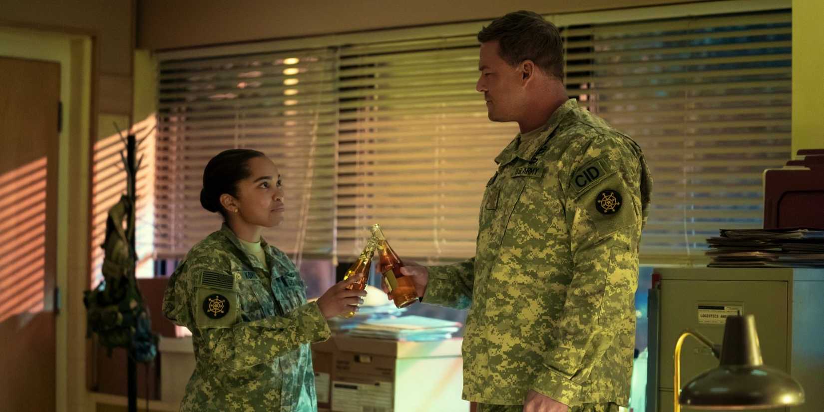 Reacher and Kohl (Mariah Robinson) toast with beers in Reacher season 3
