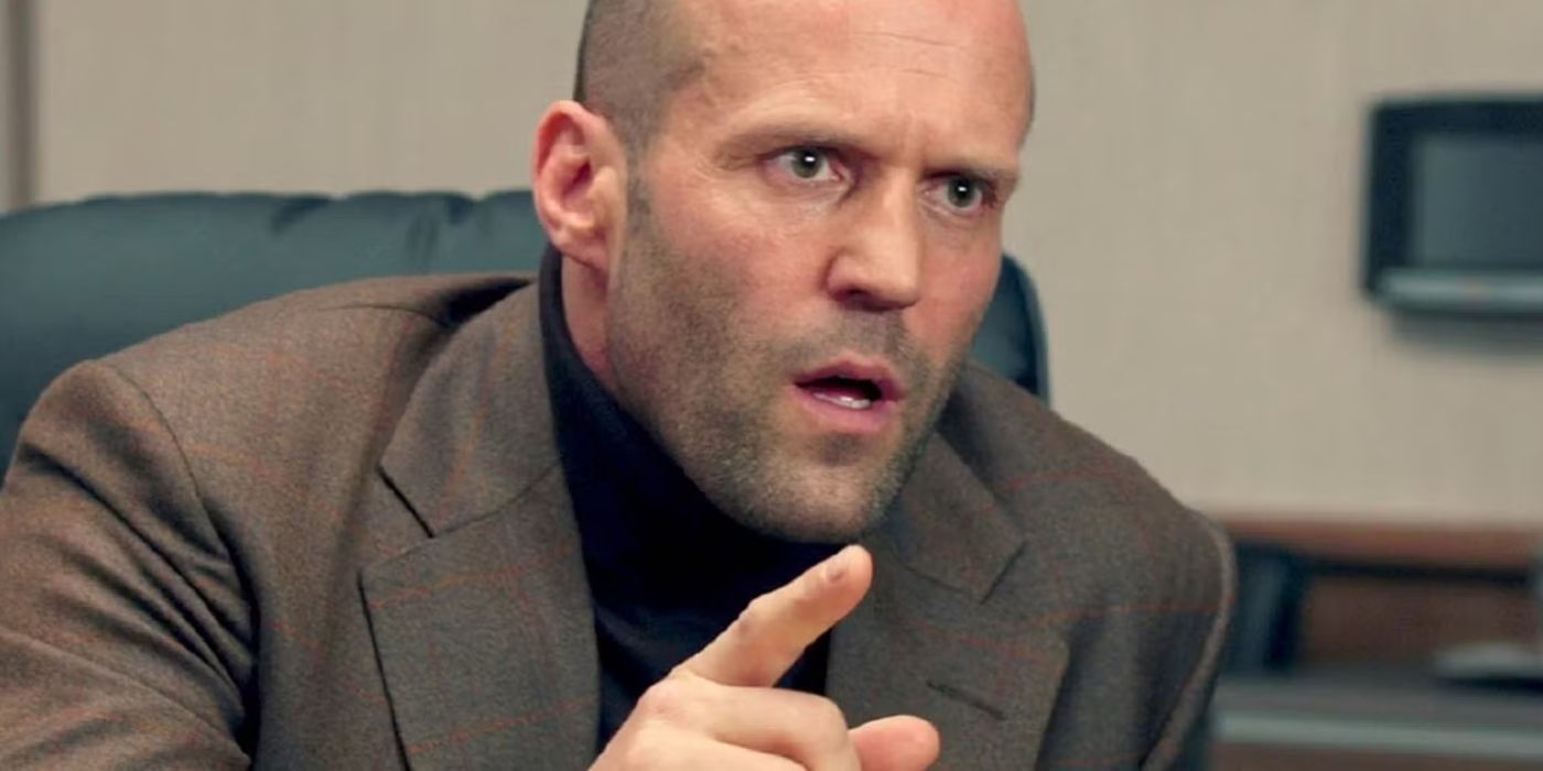 Rick Ford (Jason Statham) pointing for emphasis as he talks in Spy (2015)