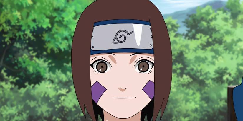 Rin smiling as she stands on a field.