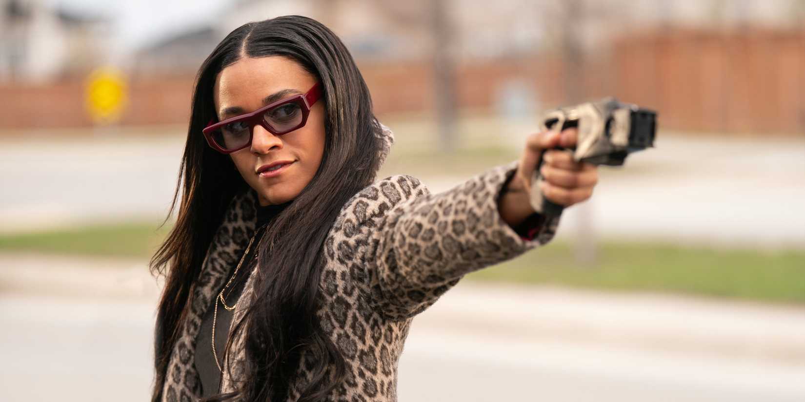 Rose aims a taser in Love Hurts