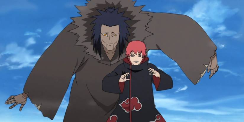 Sasori and his Third Kazekage puppet prepared to fight against an opponent.