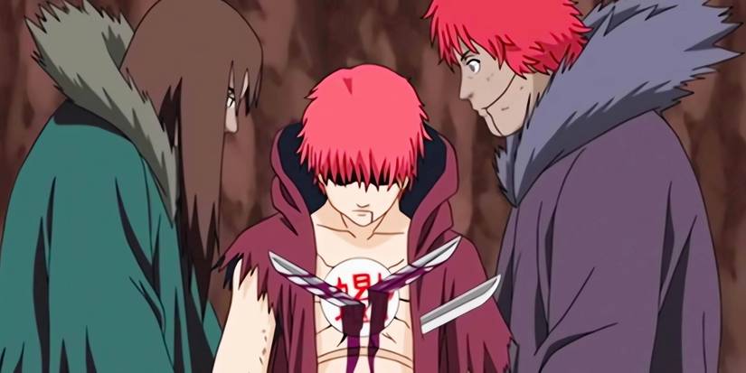 Sasori dies in the arms of his parents' puppets.