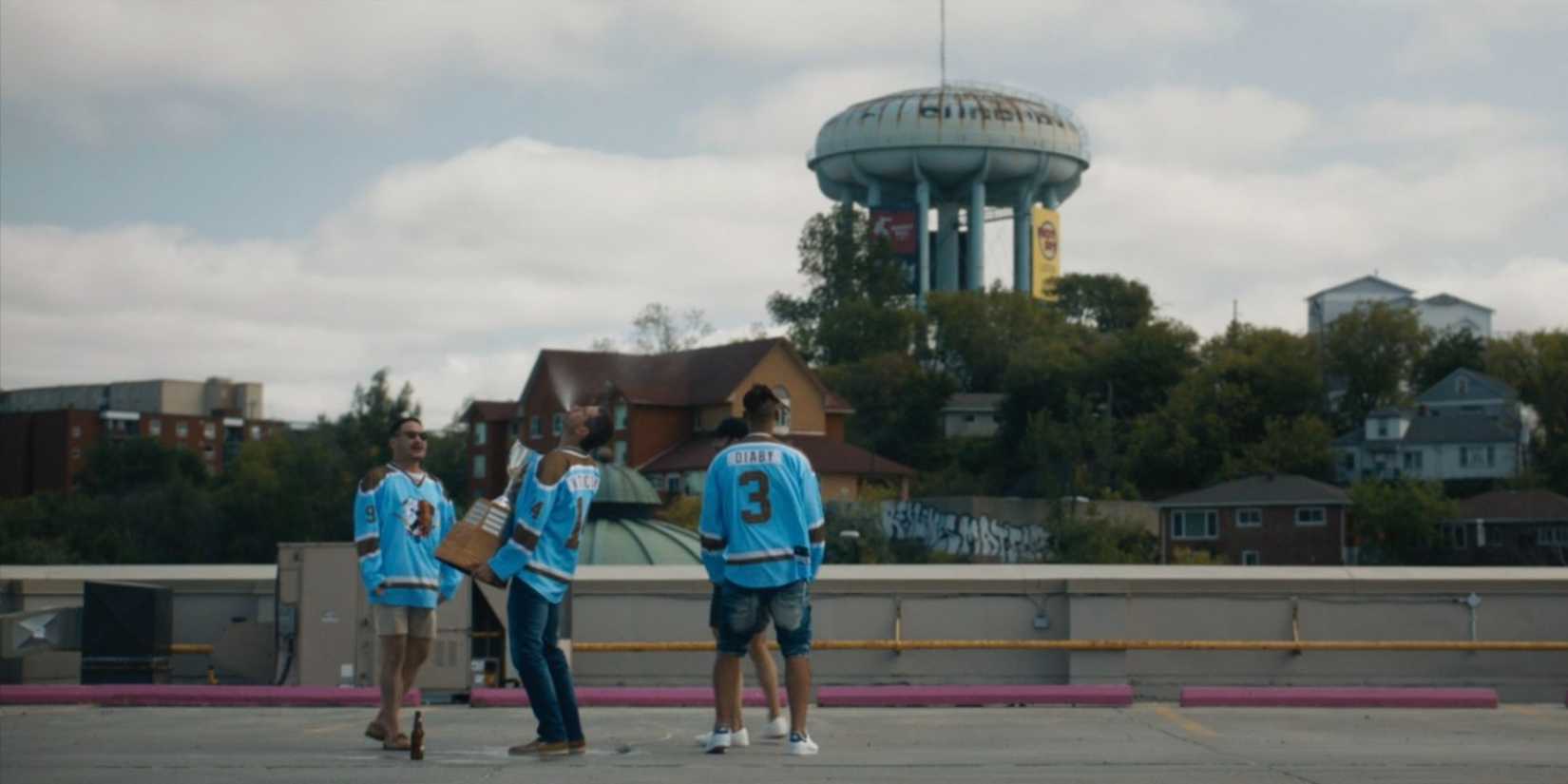 The Bulldogs celebrating at the Sudbury Water Tower in season 4 of Shoresy