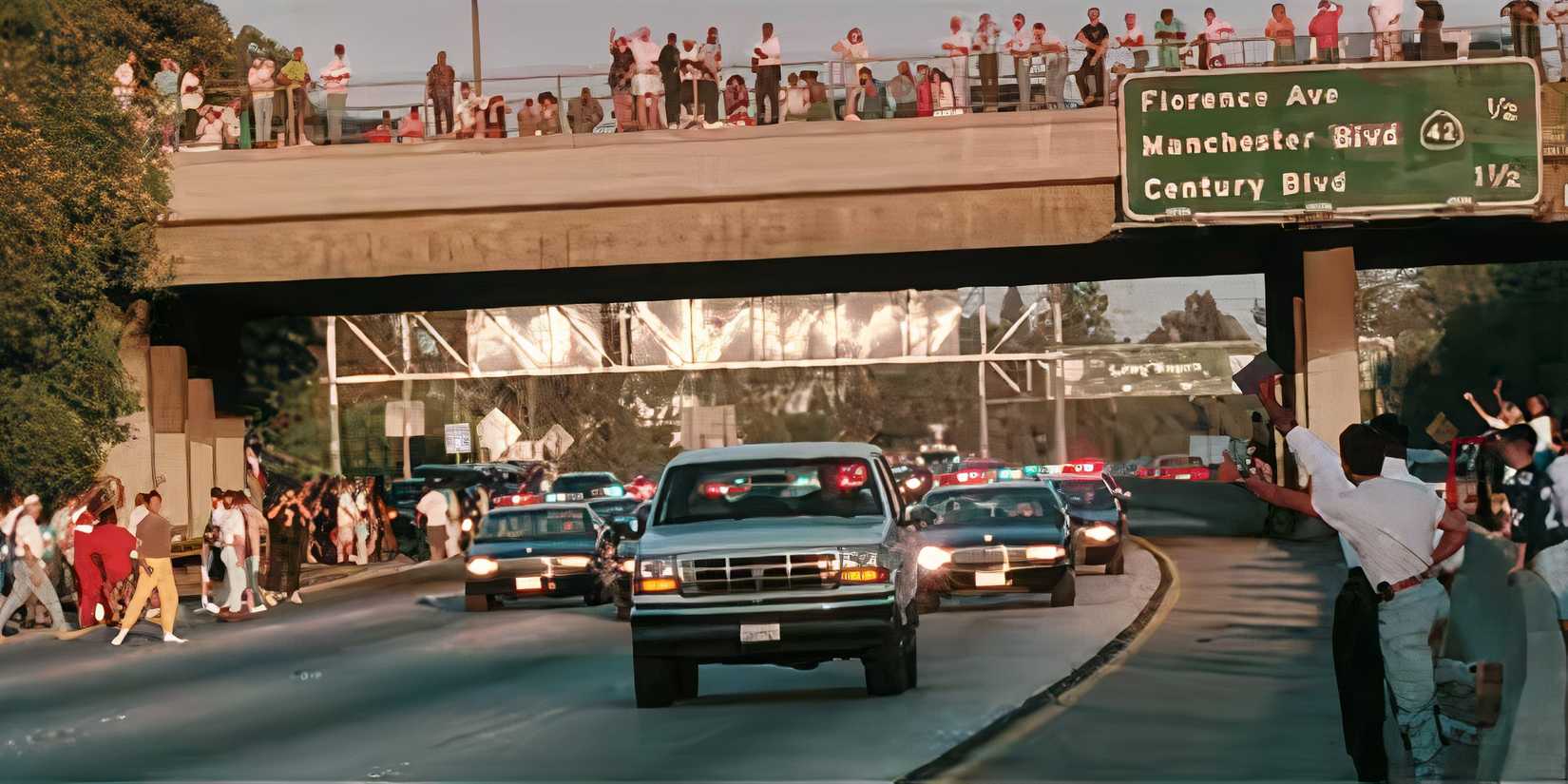 Still from OJ Doc, Bronco with police and people cheering