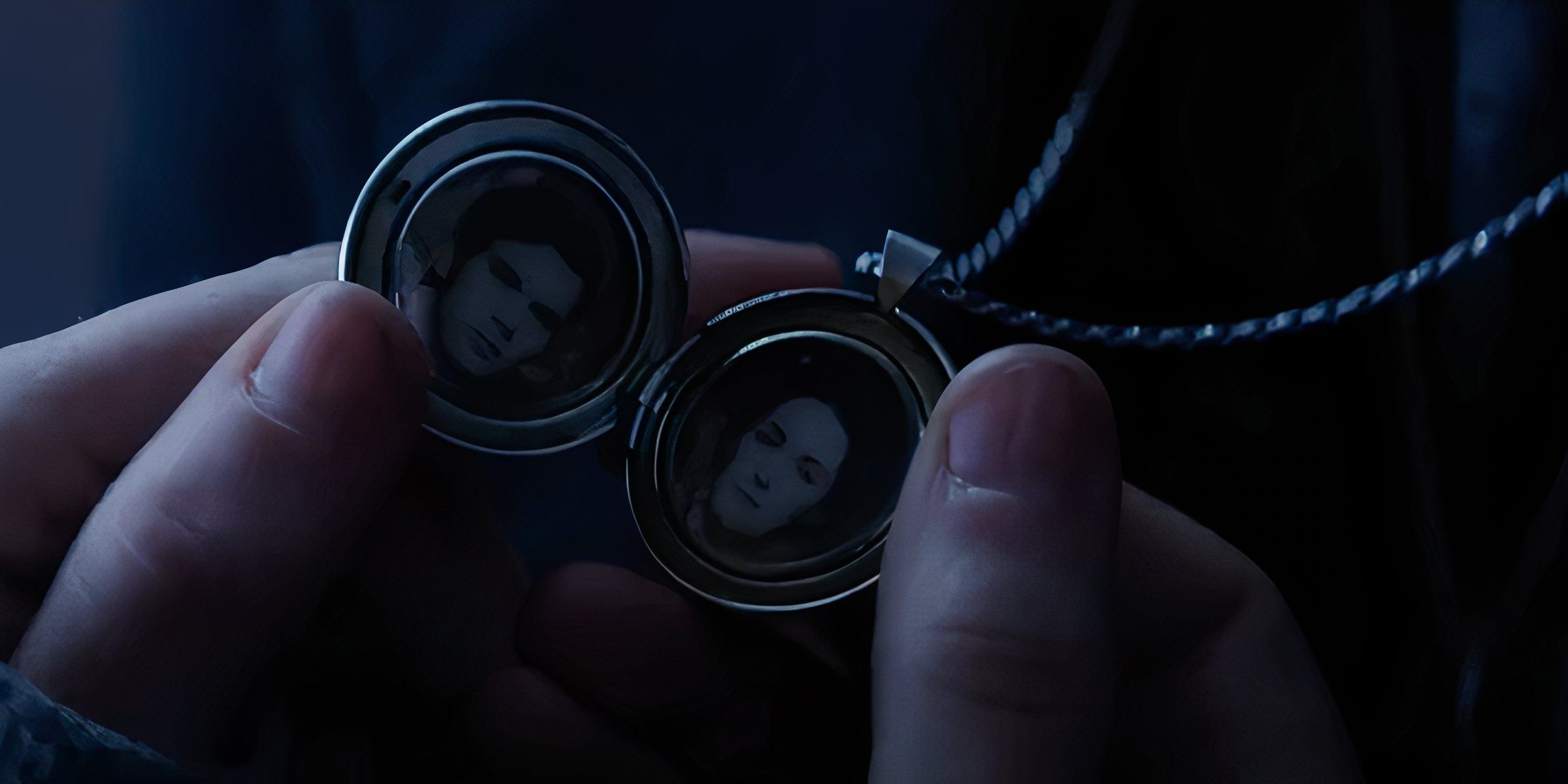 A locket with pictures of Luce and Daniel