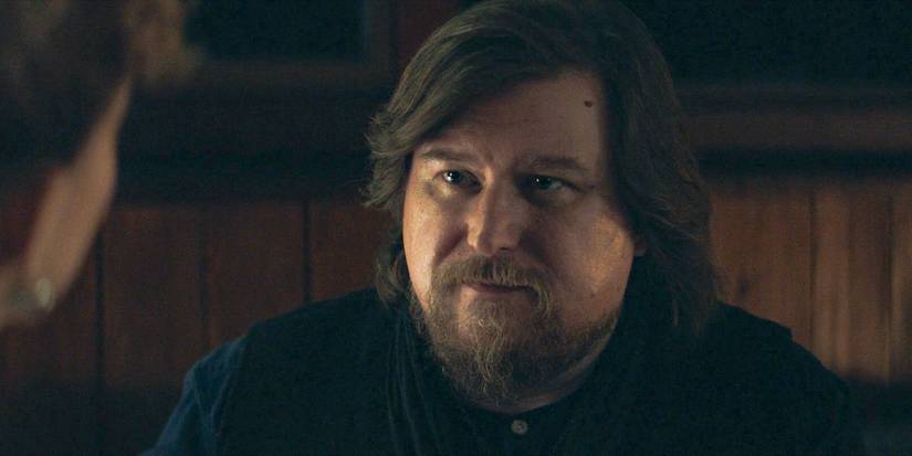 Ricken Hale (Michael Chernus) looking at Natalie (Sydney Cole Alexander) in Severance season 2, episode 3