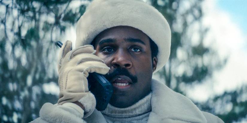 Milchick (Tramell Tillman) communicating via radio in Severance Season 2 Ep 4
