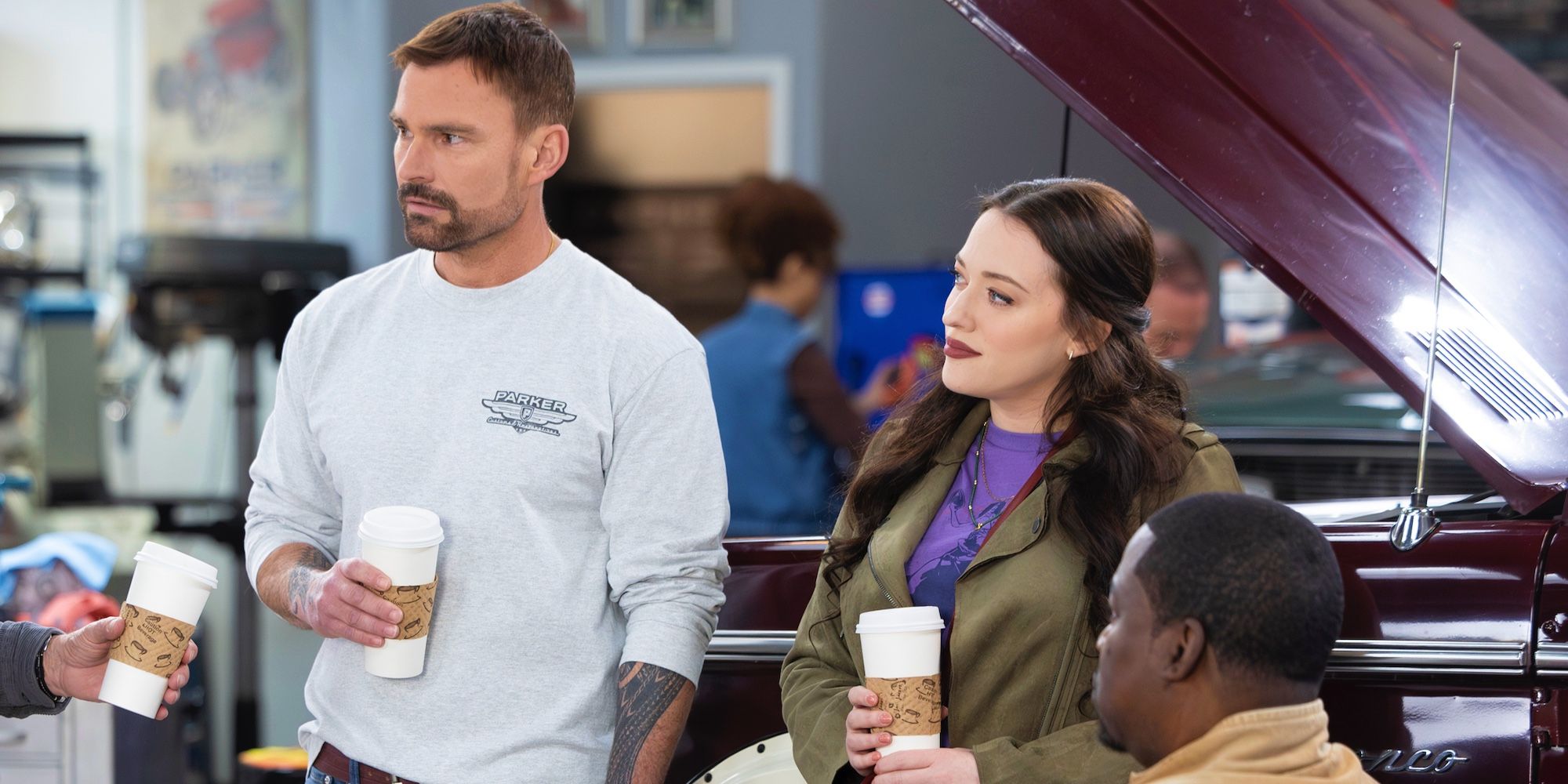 Seann William Scott as Gabriel and Kat Dennings as Riley drinking coffee in Shifting Gears