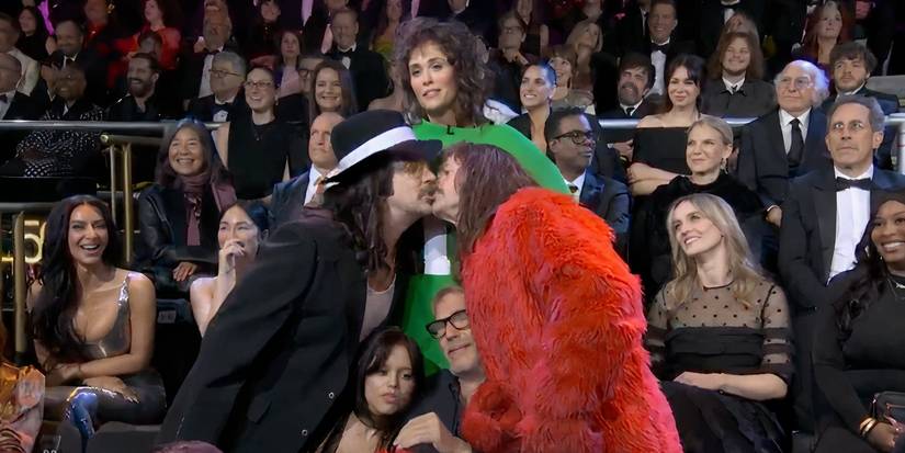 Will Forte and Jason Sudeikis kiss as Jenna Ortega and Kevin Costner look uncomfortable between them on SNL 50
