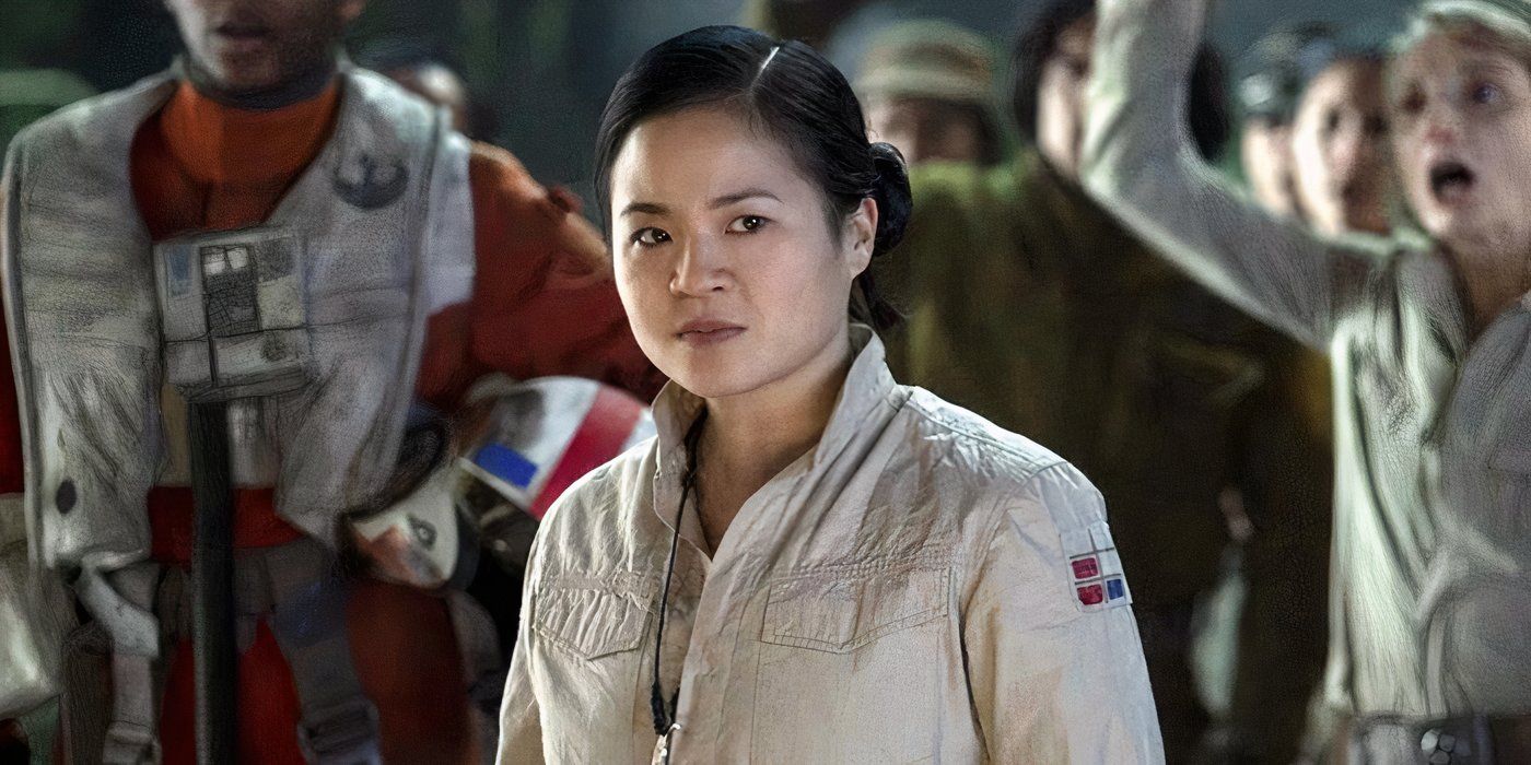 Star Wars' Rose Tico with other members of the Resistance cheering behind her.