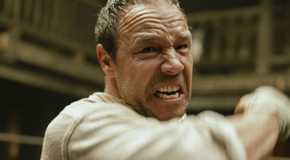 Stephen Graham as Sugar Goodson is about to hit someone in A Thousand Blows