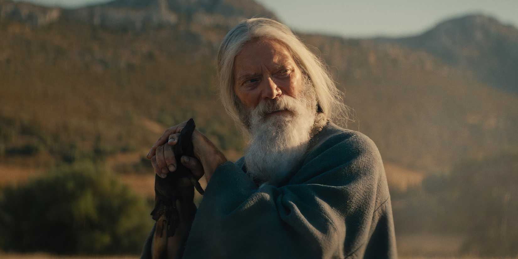 Stephen Lang as Samuel looking intensely while leaning on his walking stick in House of David