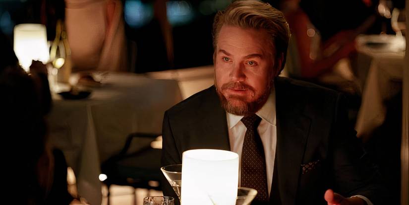 Stuart Lane talks while at dinner in Suits LA