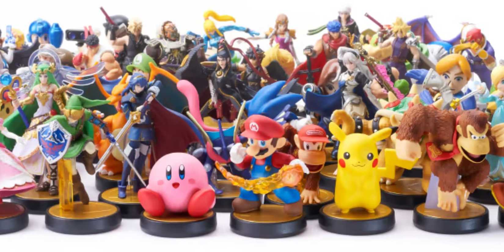 A collection of amiibo from the Super Smash Bros. series, placed closely against one another in a large cluster.