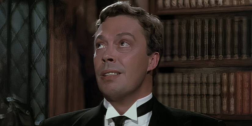 Tim Curry as Wadsworth looking up in Clue