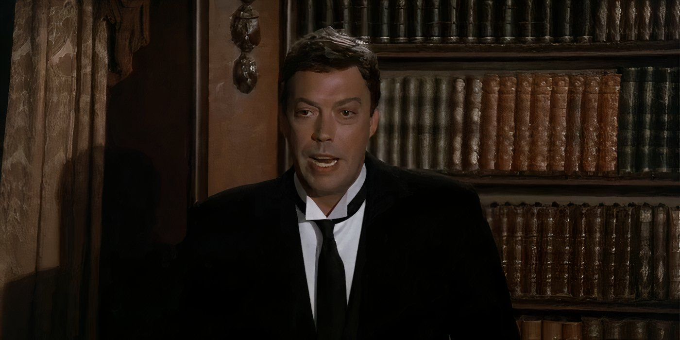 Tim Curry as Wadsworth talking to the guests on track.