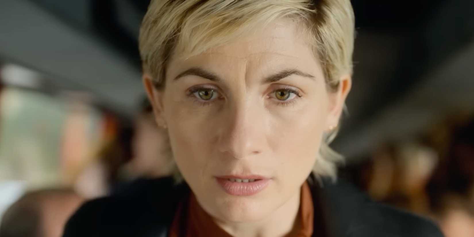 Toxic Town Jodie Whittaker standing on a bus looking very concerned