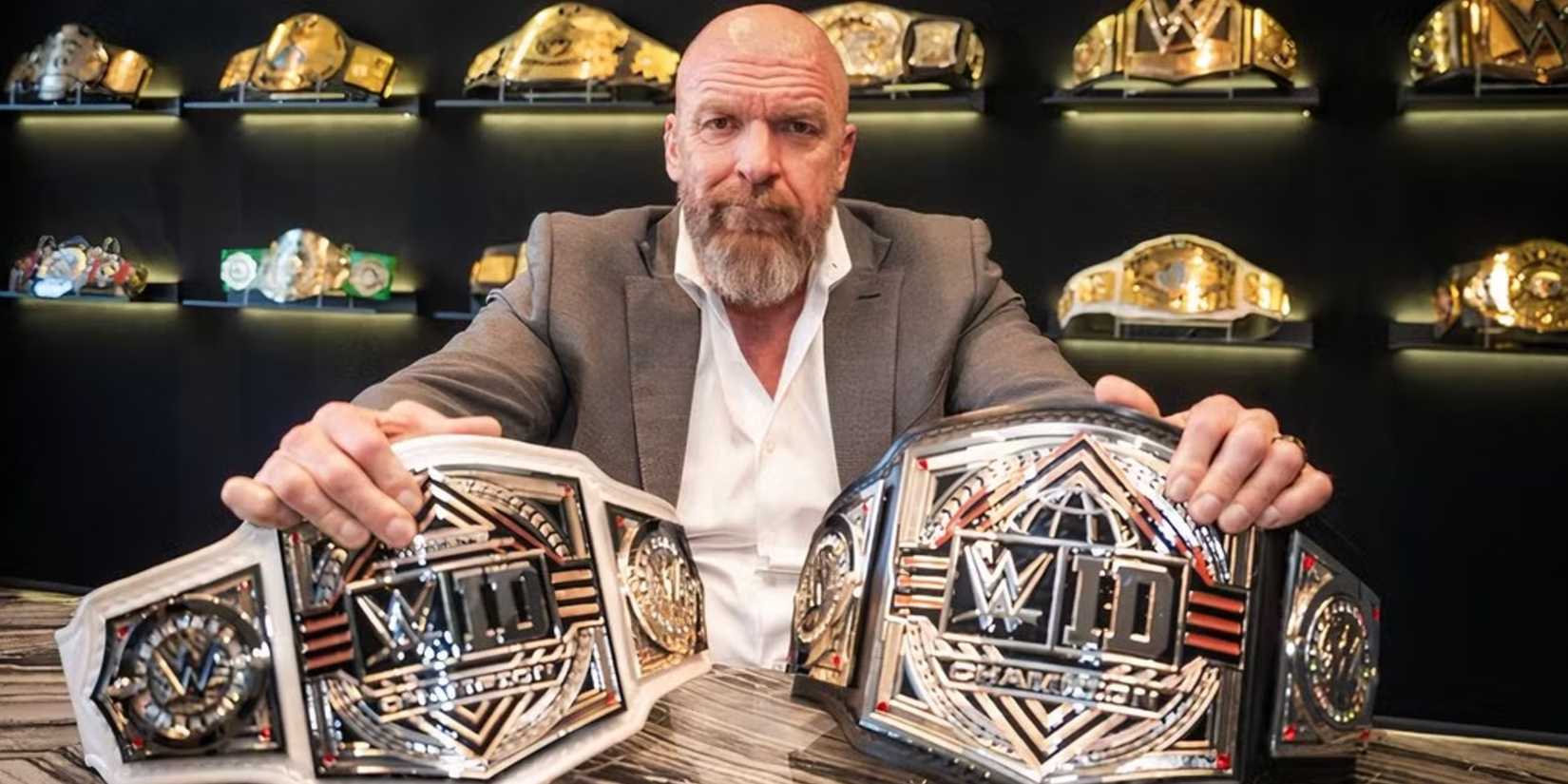 Triple H with the WWE ID belts