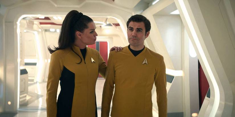 Una's hand on Kirk's shoulder in Strange New Worlds