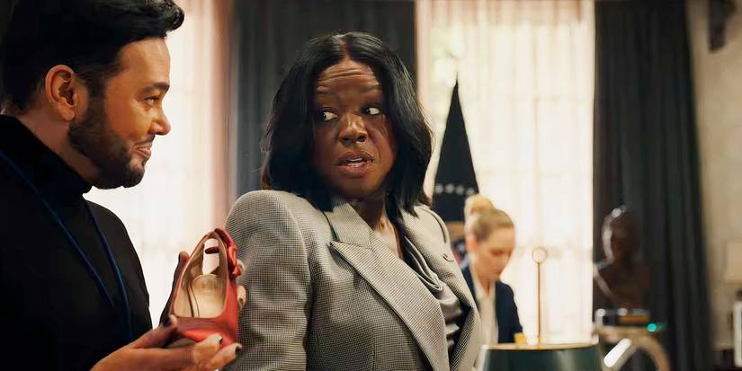 Viola Davis speaking to an assistant in the Oval Office in G20