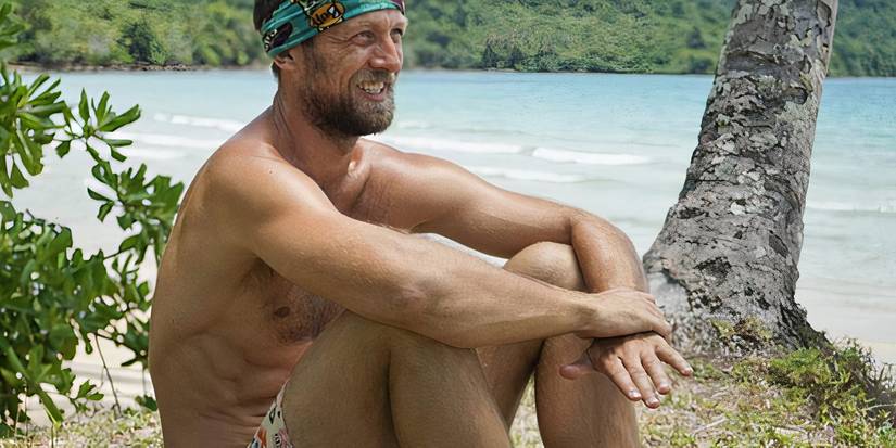 Vytas from Survivor smiling and looking off to the side