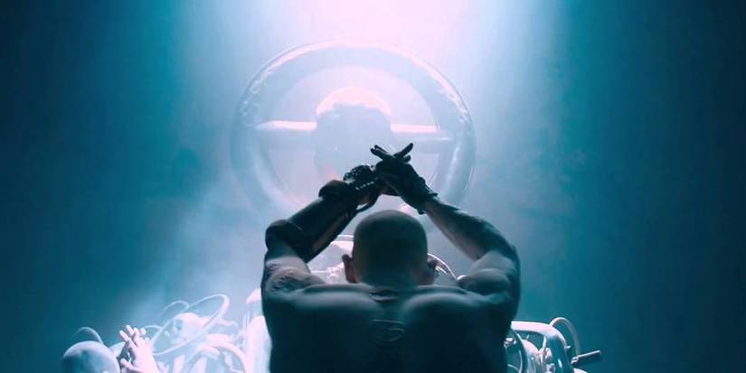 War Boys praying to a V8 engine in Mad Max Fury Road