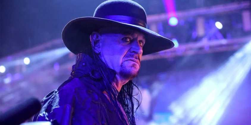 WWE star The Undertaker scowling at the camera.
