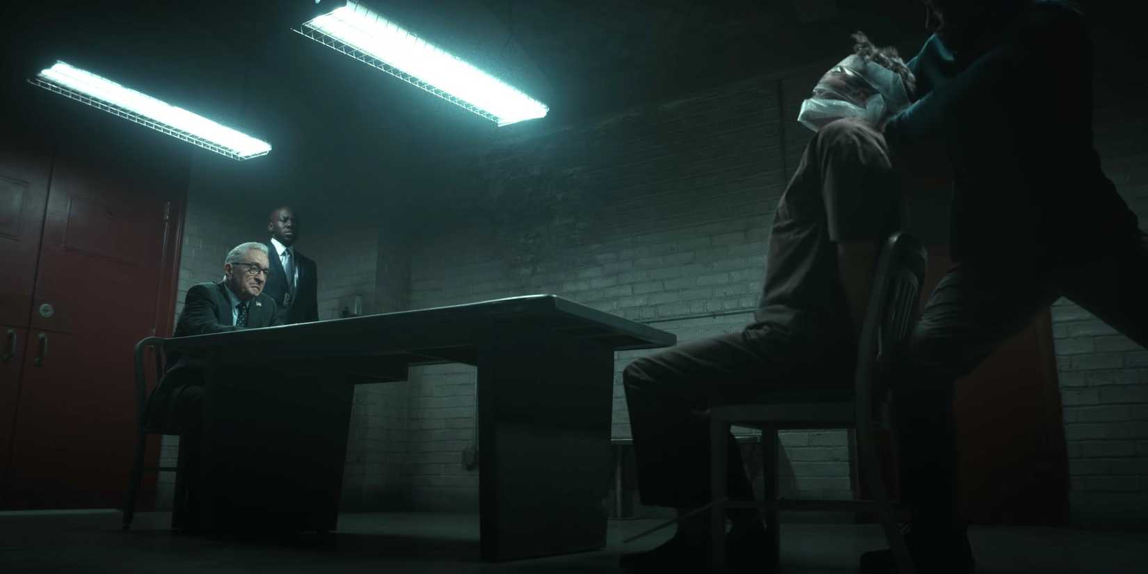George Mullen (Robert De Niro) watches as Evan Green (Dan Stevens) is strangled in Zero Day season 1, episode 4