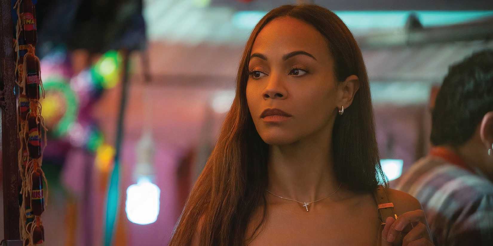 Actress Zoe Saldaña as Rita looking unhappy in Emilia Pérez.