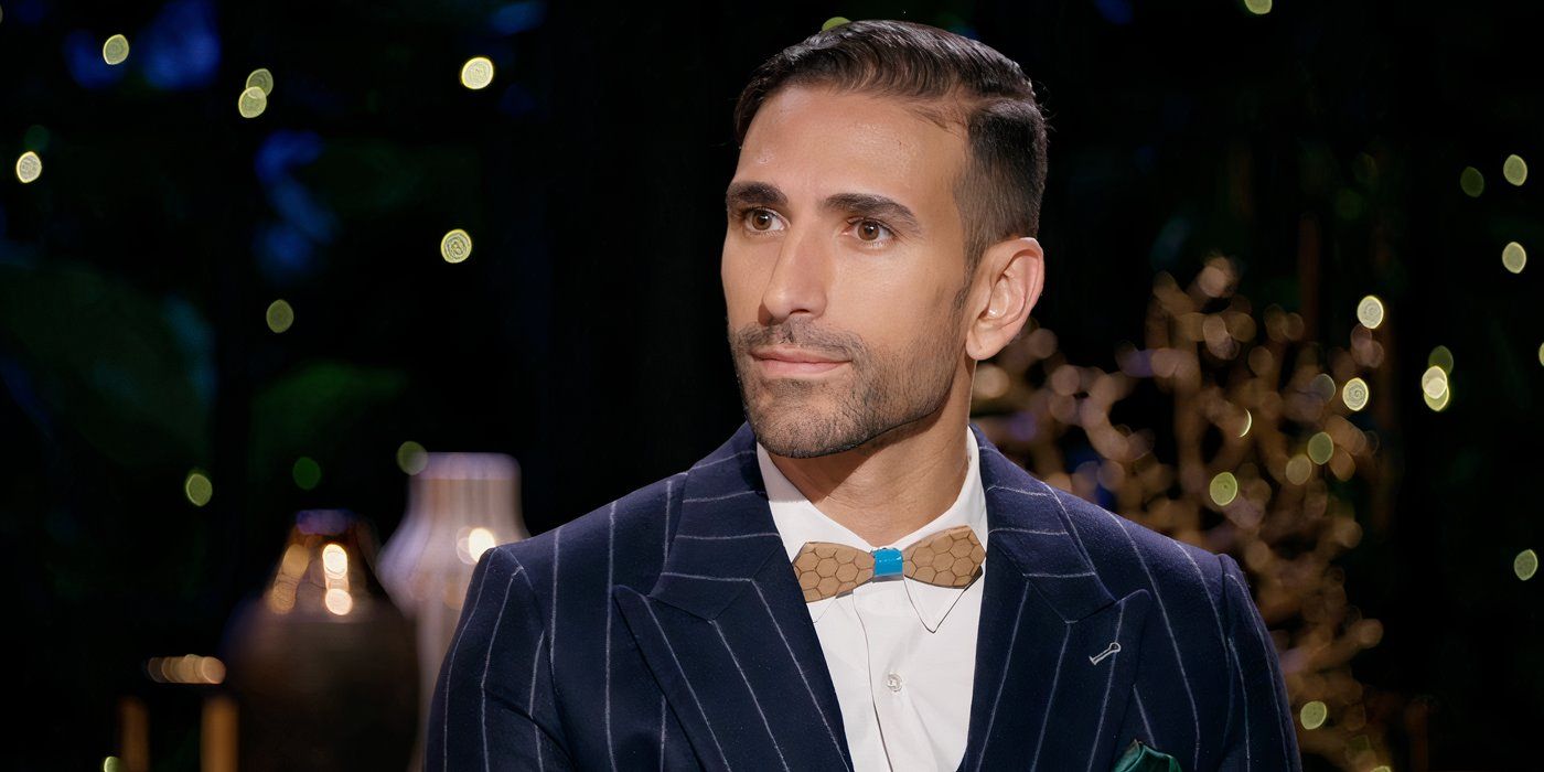 Juan Franco sitting with a striped suit and bowtie on the Married At First Sight reunion