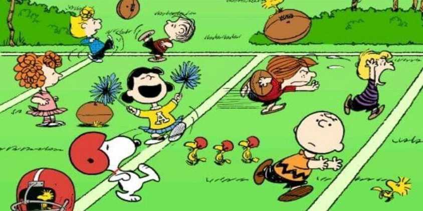 Peanuts playing football.