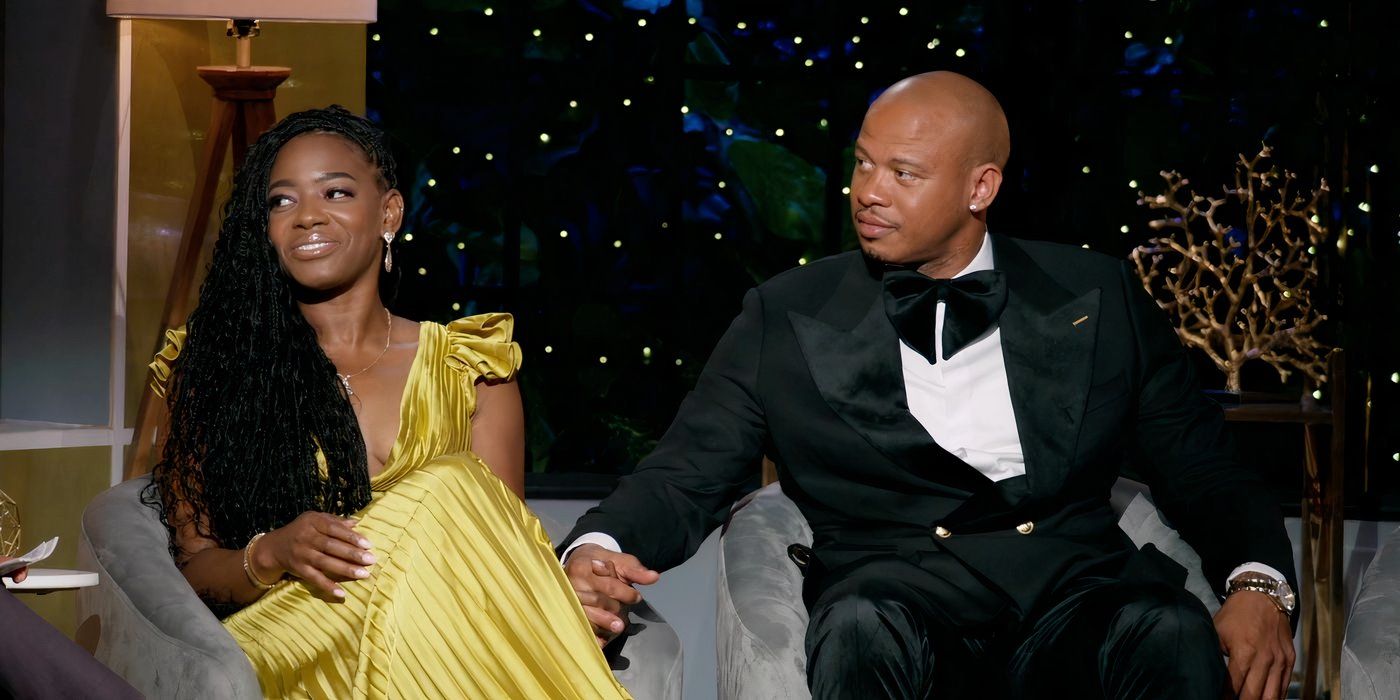 Emem Obot and Brandon Williams sitting together on stage on the Married At First Sight reunion