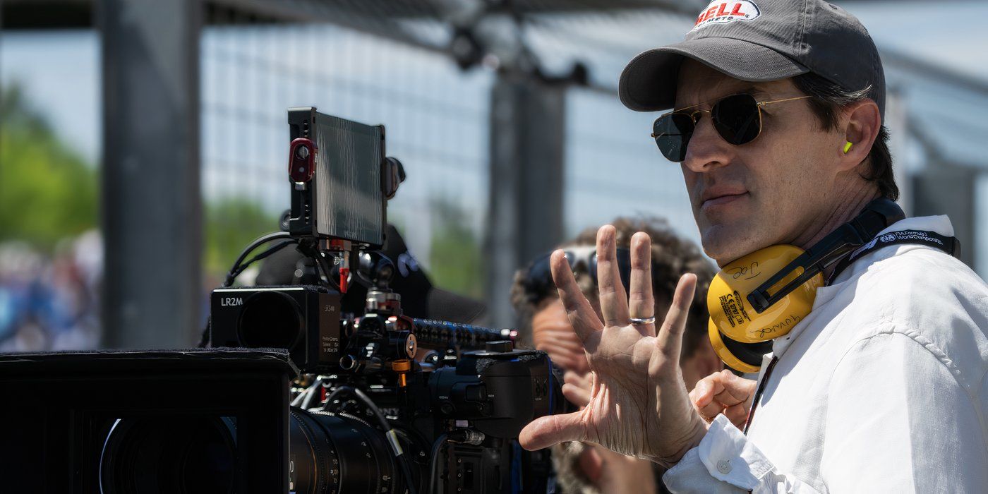 A behind the scenes image of Joseph Kosinski directing F1