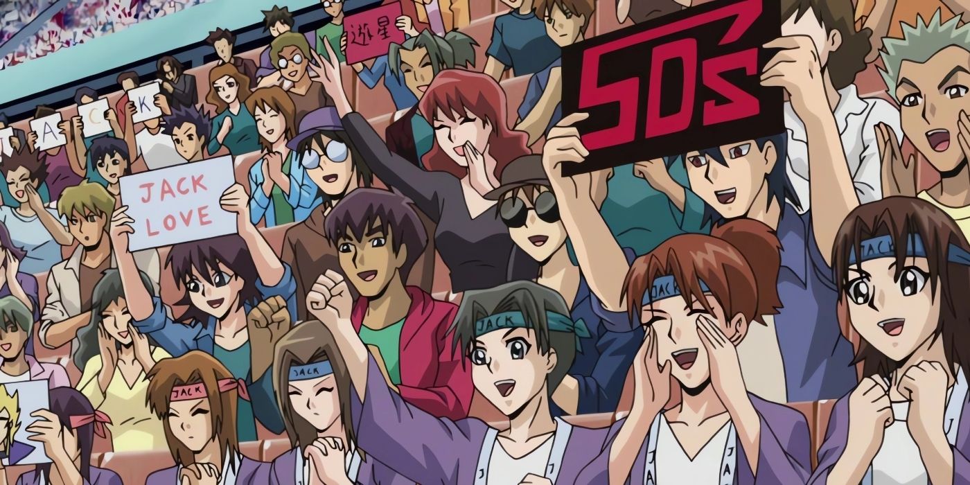 A crowd cheering for Jack and Team 5Ds.