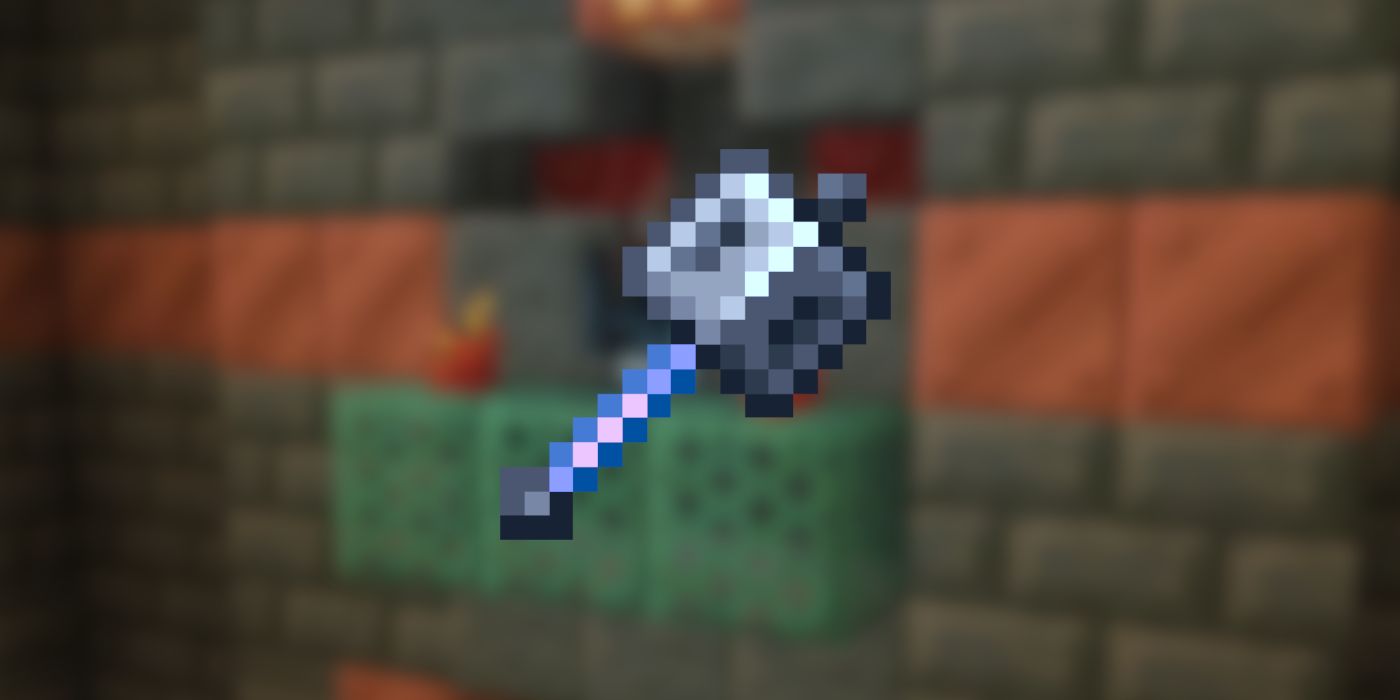 A mace with the ominous trial spawner in the background in Minecraft