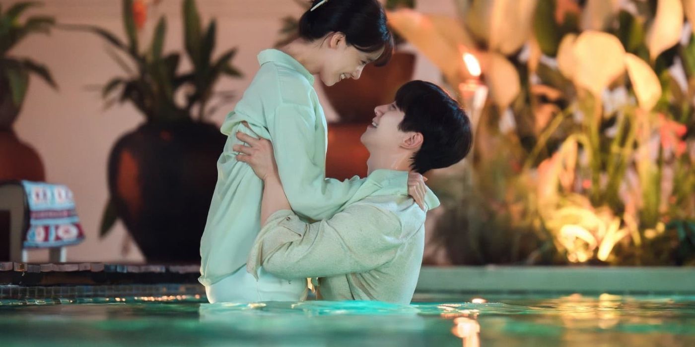 A man lifting a woman in a pool in King the Land