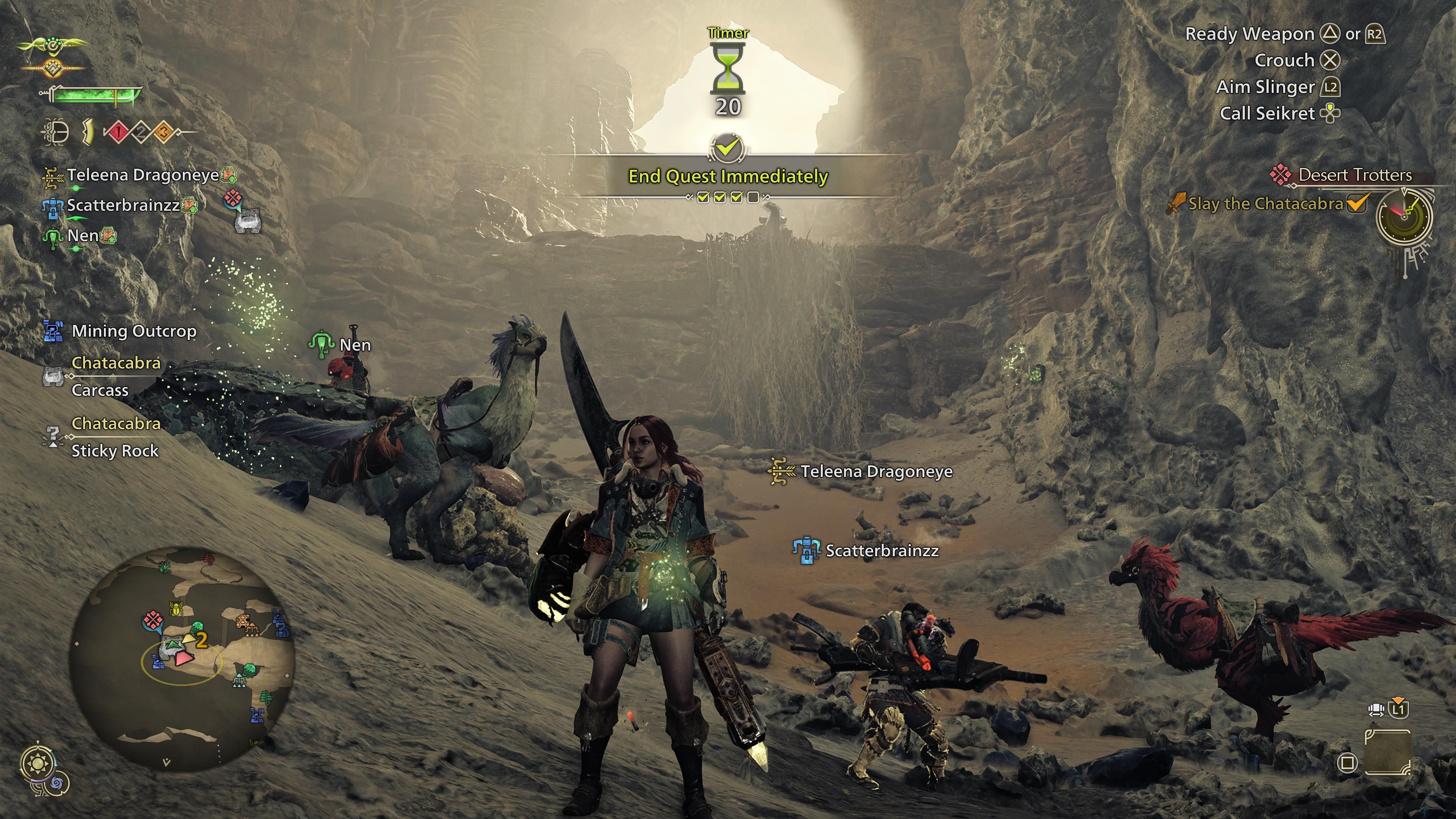 A monster hunter player standing in front of a fallen chatacabra with other players helping them