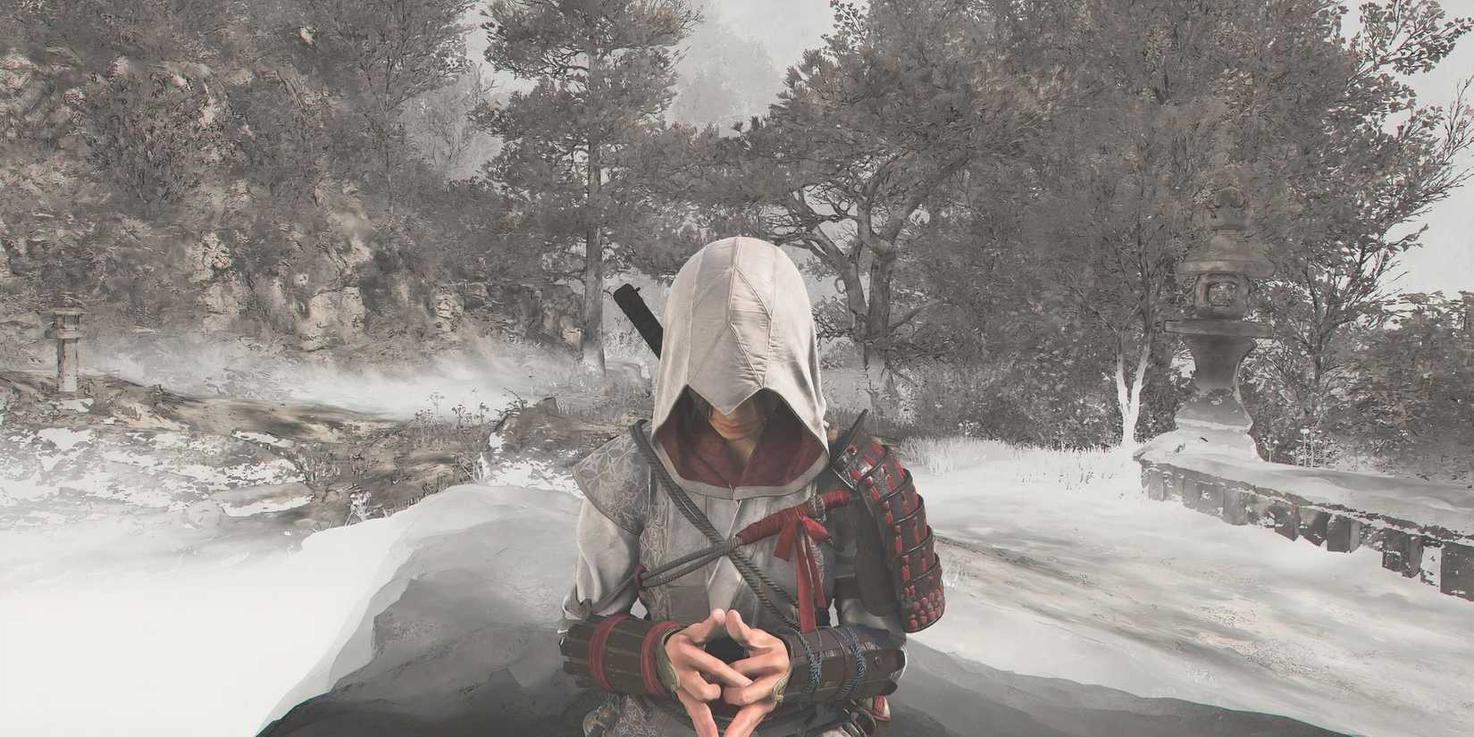 Naoe praying in the snow in Assassin's Creed Shadows.