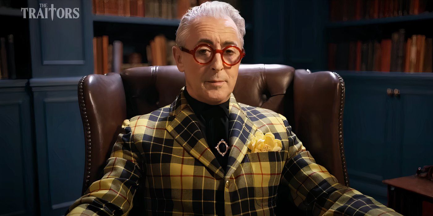 Alan Cumming sitting in an armchair on The Traitors