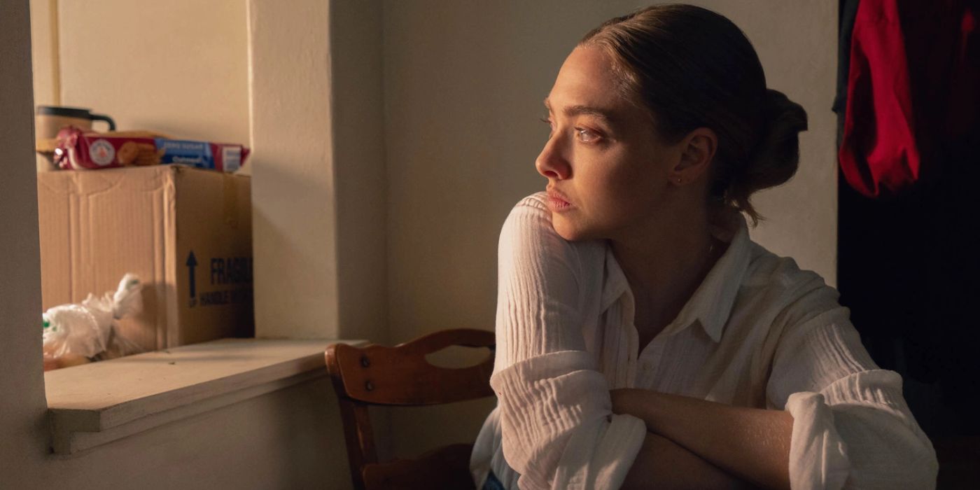 Amanda Seyfried olhando pela janela em Long Bright River