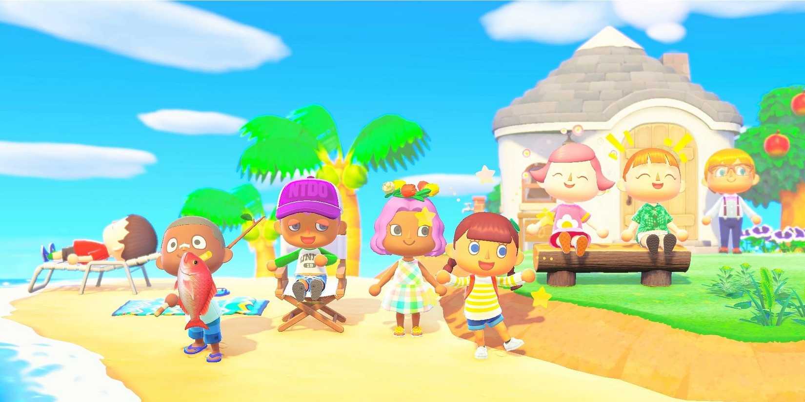 A group of players hanging out on a beach in Animal Crossing New Horizons.