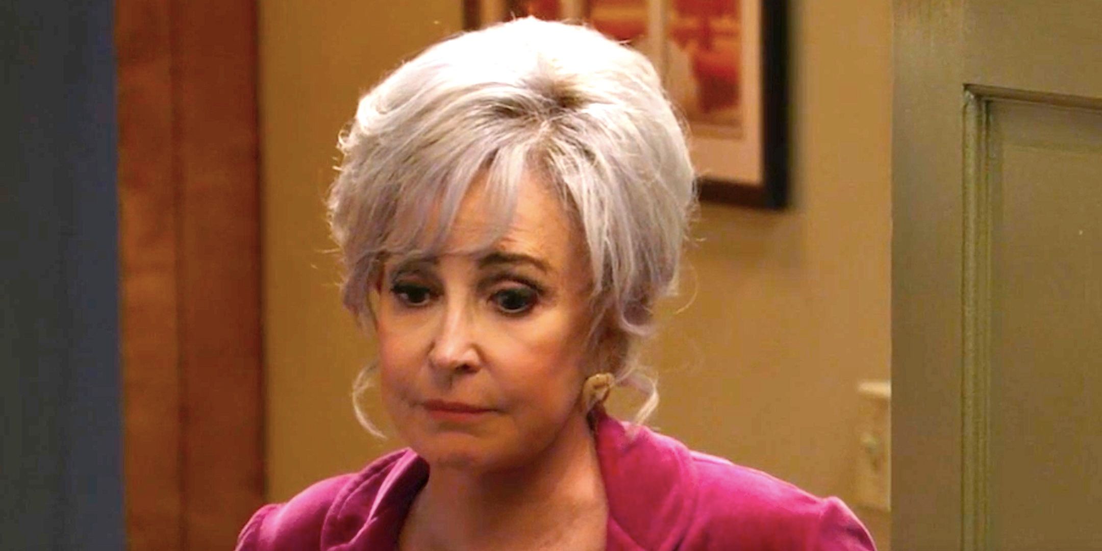 Annie Potts' Meemaw looking sad in a motel doorway from Georgie &amp; Mandy&rsquo;s First Marriage episode 14